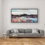 Abstract landscape painting, original oil painting on canvas hanging in a modern living room with a gray sofa