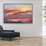 Sunset painting, original oil painting on canvas hanging in a modern living room with a black sofa