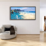 Beach painting, original oil painting on canvas hanging in a modern living room with a beige sofa and home decor