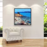 Original Impressionist Oil Painting on Canvas of a Sardinian Beach hanging in a modern living room with a white sofa and home decor