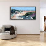 Beach painting, original oil painting on canvas hanging in a modern living room with a beige sofa and home decor