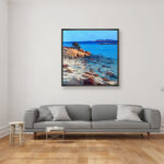 Original Impressionist Oil Painting on Canvas of a Sardinian Beach hanging in a modern living room with a gray sofa and home decor