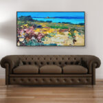 Beach painting, original oil painting on canvas hanging in a modern living room with a brown sofa and home decor