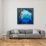 Blue Grotto painting, original oil painting on canvas hanging in a modern living room with a gray sofa and home decor