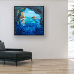 Blue Grotto painting, original oil painting on canvas hanging in a modern living room with a black sofa and home decor