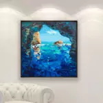 Blue Grotto painting, original oil painting on canvas hanging in a modern living room with a white sofa and home decor