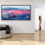 Landscape painting with lavender, original oil painting on canvas hanging in a modern living room with a beige sofa