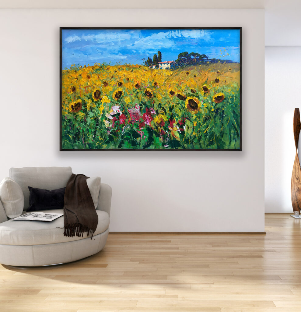 Landscape painting with sunflowers, original oil painting on canvas hanging in a modern living room with a beige sofa and home decor