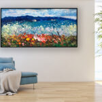 Landscape painting, original oil painting on canvas hanging in a modern living room with a blue sofa