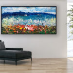 Landscape painting, original oil painting on canvas hanging in a modern living room with a black sofa