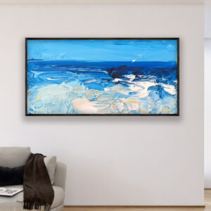 Modern beach oil painting on canvas with rich impasto texture hanging in a modern living room with a beige sofa, viewed from a medium distance.