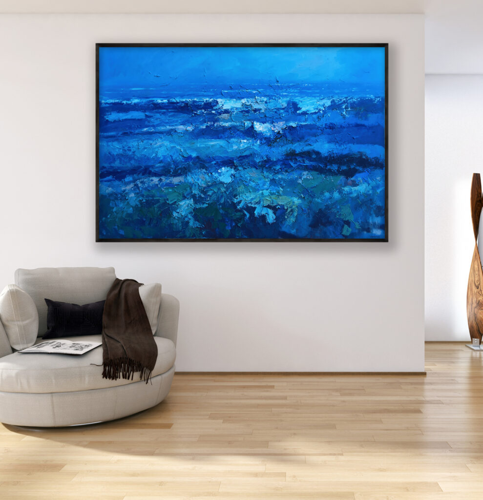 Ocean painting, original oil painting on canvas hanging in a modern living room with a beige sofa and home decor