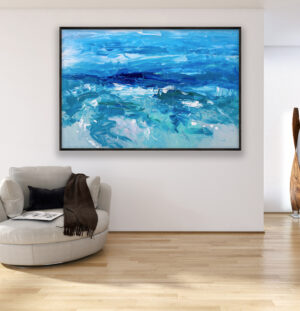 Ocean painting, original oil painting on canvas hanging in a modern living room with a beige sofa