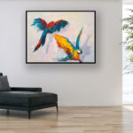 Parrots painting, original oil painting on canvas hanging in a modern living room with a black sofa and home decor