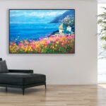 Positano oil painting on canvas, original modern impressionist Amalfi Coast wall art, framed, perfect for living room wall decor and as unique gift for her, displayed on the wall above a black sofa in a stylish living room