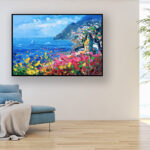 Positano painting original oil painting on canvas hanging in a modern living room with a blue sofa