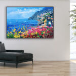 Positano painting, original oil painting on canvas hanging in a modern living room with a black sofa