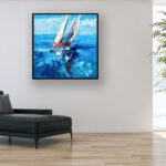 Vibrant sailboats painting, original oil painting on canvas hanging in a modern living room with a black sofa and home decor