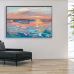 Sunset painting, original oil painting on canvas hanging in a modern living room with a black sofa