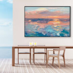 Sunset painting, original oil painting on canvas hanging in a modern living room with a table and ocean view