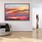 Sunset painting, original oil painting on canvas hanging in a modern living room with a beige sofa