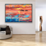 Sunset painting, original oil painting on canvas hanging in a modern living room with a beige sofa