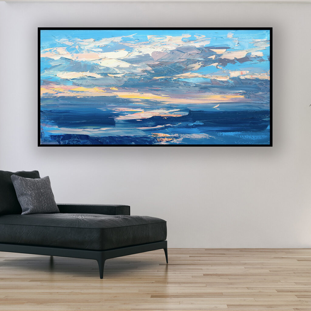 Abstract sunset painting, original oil painting on canvas hanging in a modern living room with a black sofa