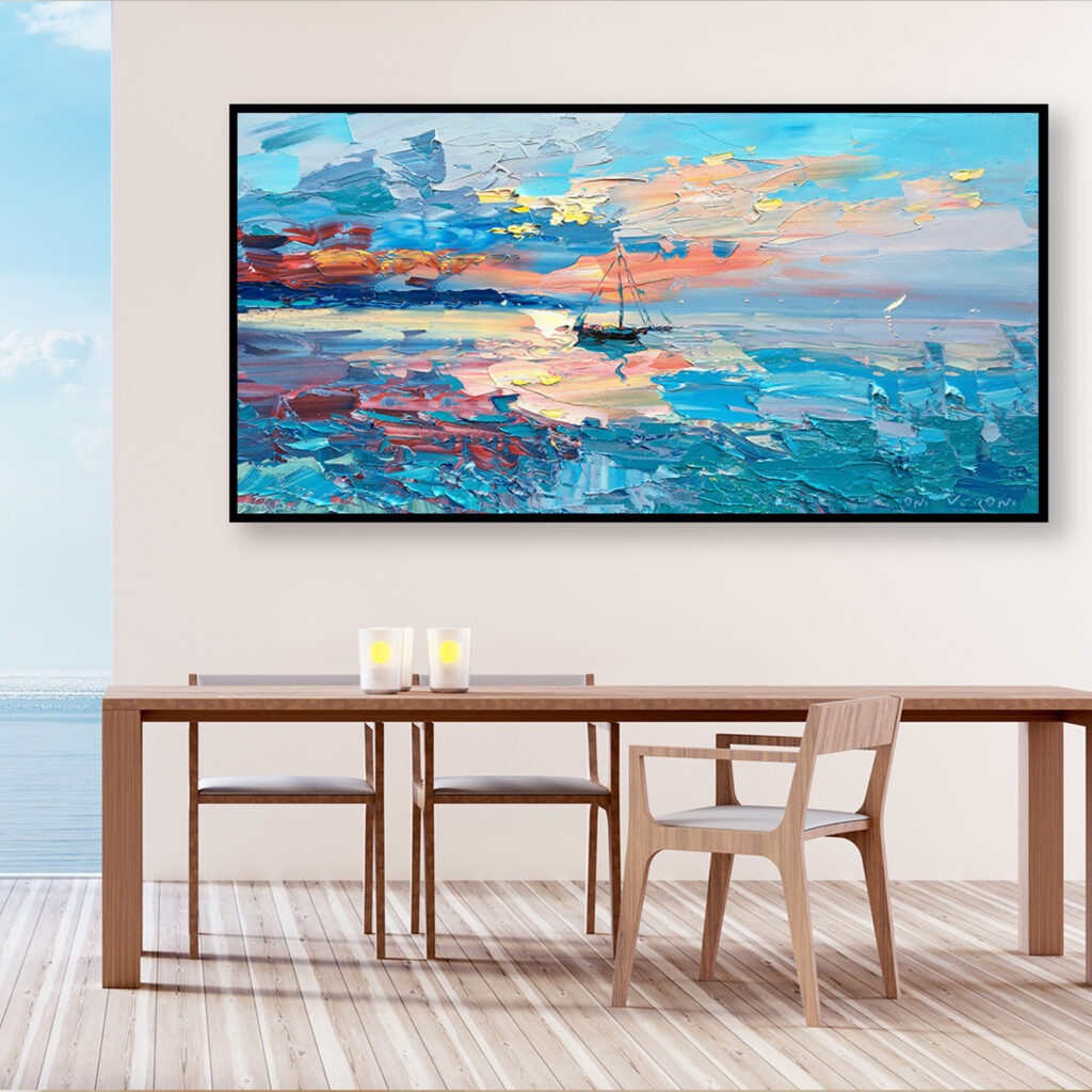 Sunset painting, original oil painting on canvas hanging in a modern living room with a table and ocean view