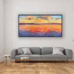 Sunset painting, original oil painting on canvas hanging in a modern living room with a gray sofa