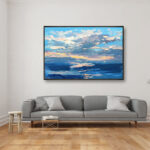 Sunset painting, original oil painting on canvas hanging in a modern living room with a gray sofa