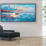 Sunset painting, original oil painting on canvas hanging in a modern living room with a black sofa