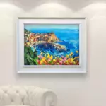 Vernazza Cinque Terre painting with cactus and flowers, original oil painting on canvas hanging in a modern living room with a white sofa and home decor