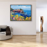 Vernazza Cinque Terre painting, original oil painting on canvas hanging in a modern living room with a beige sofa and home decor