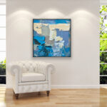 Abstract painting, original oil painting on canvas hanging in a modern living room with a white sofa and home decor