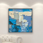 Abstract painting, original oil painting on canvas hanging in a modern living room with a white sofa and home decor