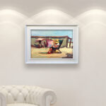 Figurative oil painting on canvas of a woman on the beach, hanging in a modern living room with a white sofa and home decor