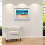 Modern Oil Painting on Canvas of a Beach with Children Playing hanging in a modern living room with a white sofa and home decor