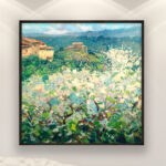 Tuscan Blooming Trees Landscape Painting on Canvas hanging in a modern living room with a white sofa and home decor