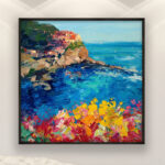 Manarola Cinque Terre painting, original oil painting on canvas hanging in a modern living room with a white sofa