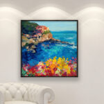 Manarola Cinque Terre painting, original oil painting on canvas hanging in a modern living room with a white sofa