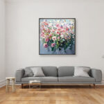 White and Pale Pink Roses painting on canvas hanging in a modern living room with a gray sofa and home decor