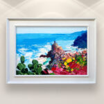 Vernazza Cinque Terre painting with cactus and flowers, original oil painting on canvas hanging in a modern living room with a white sofa and home decor