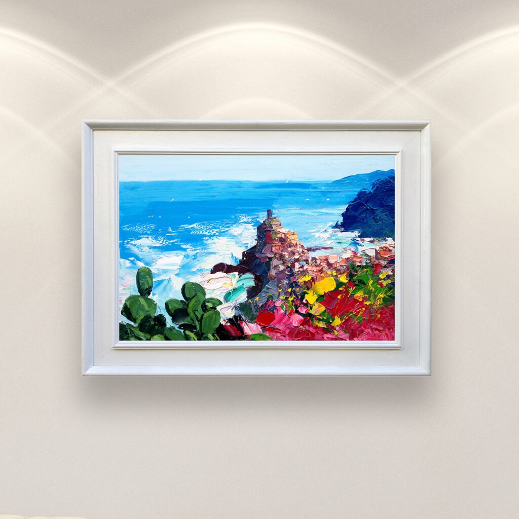 Vernazza Cinque Terre painting with cactus and flowers, original oil painting on canvas hanging in a modern living room with a white sofa and home decor