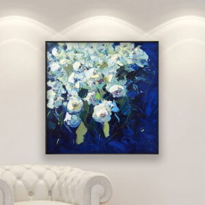 White Roses oil painting on canvas framed displayed in a modern living room with a white sofa