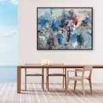 Abstract painting, original oil painting on canvas hanging in a modern living room with a table a ocean view and home decor