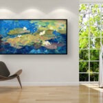 Water lilies painting, original oil painting on canvas hanging in a modern living room with a brown armchair