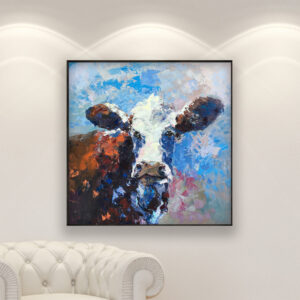 Cow painting, original oil painting on canvas hanging in a modern living room with a white sofa and home decor