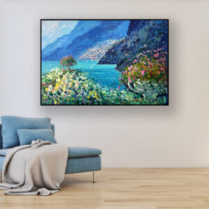 Positano painting with flowers, original oil painting on canvas hanging in a modern living room with a blue sofa