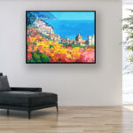 Positano painting, original oil painting on canvas hanging in a modern living room with a black sofa