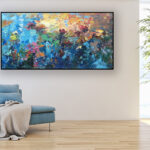 Water lilies painting, original oil painting on canvas hanging in a modern living room with a blue sofa